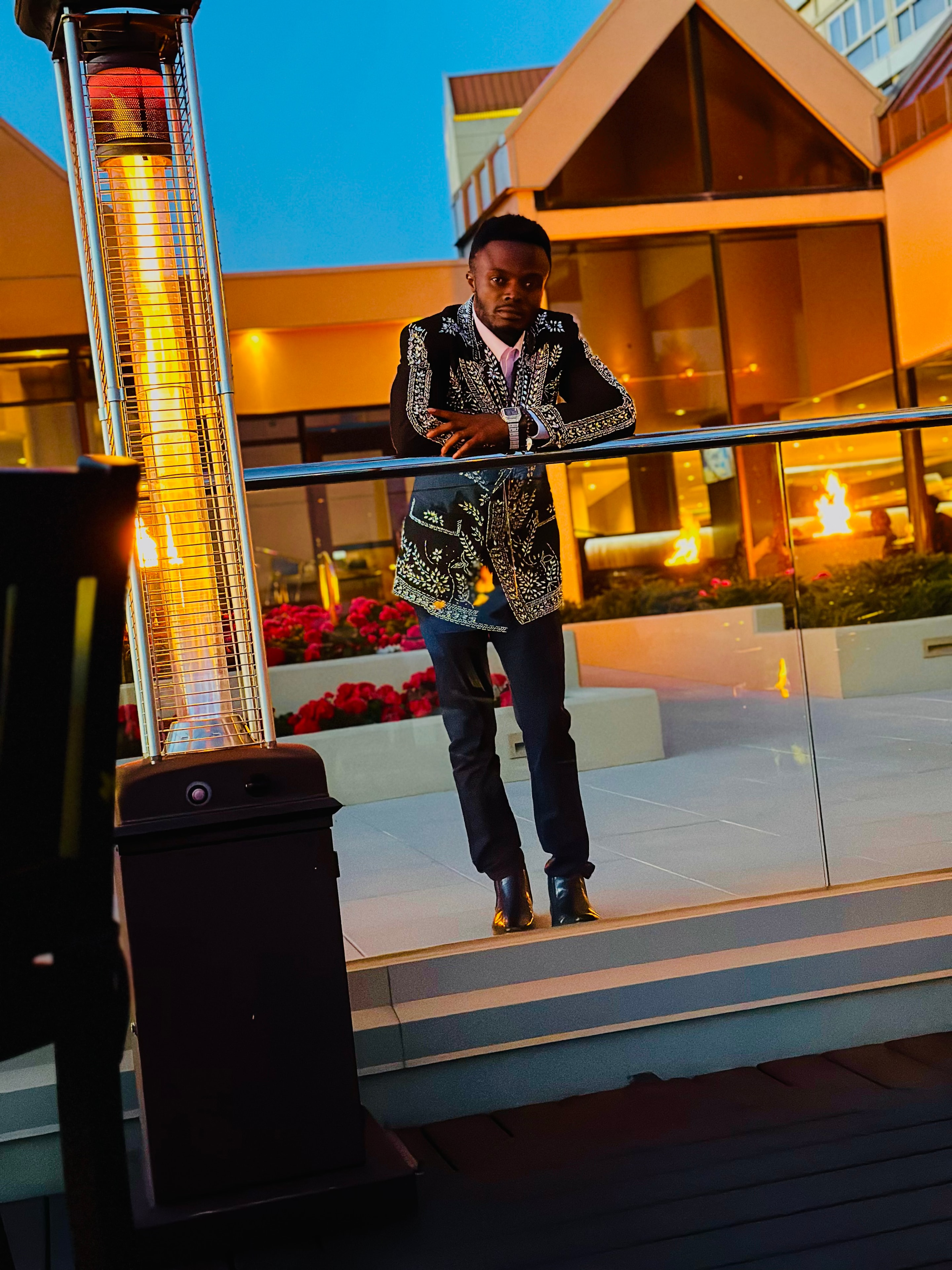DE LA ROSE — sequined jacket rooftop